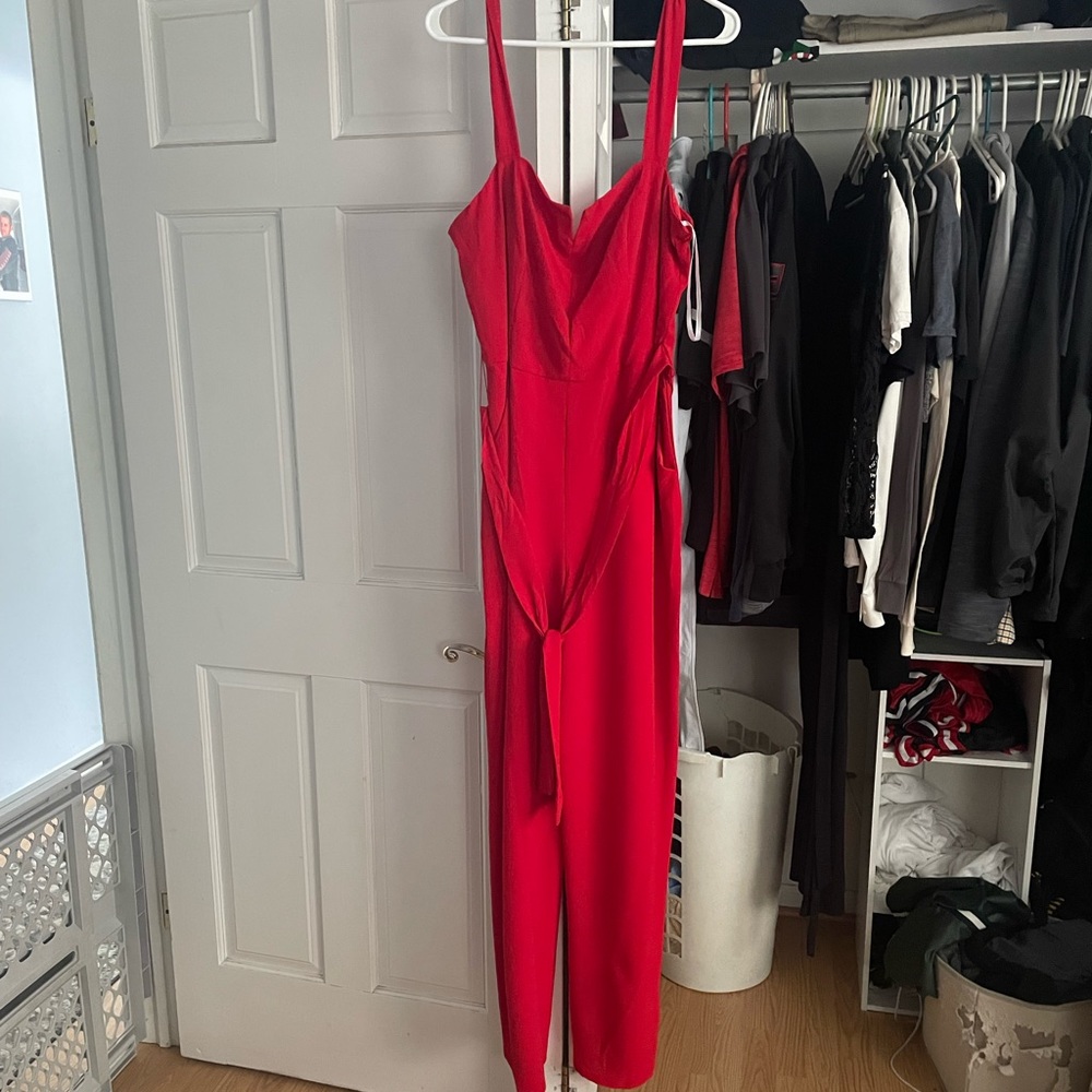 Red jumper/pantsuit sweetheart neckline.. very flattering ..